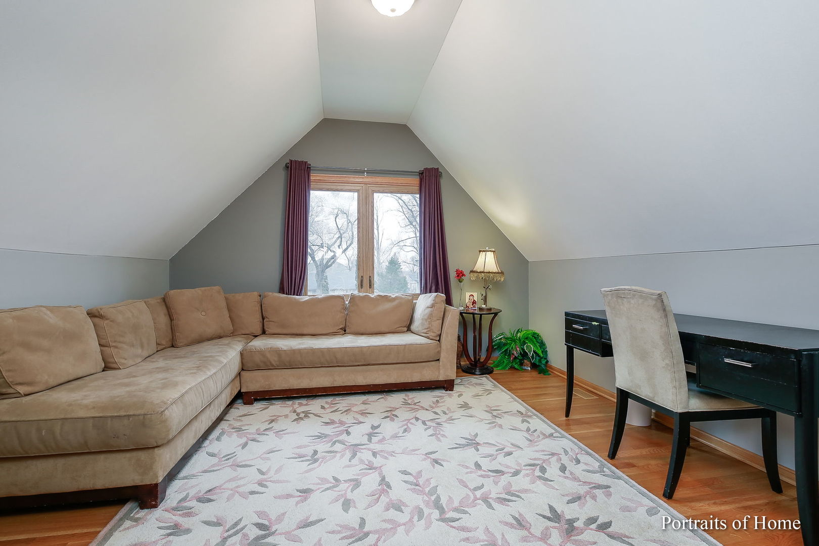 655 Mary Court Elmhurst, IL 60126 - Photo 23 of 46 a living room with furniture and a potted plant