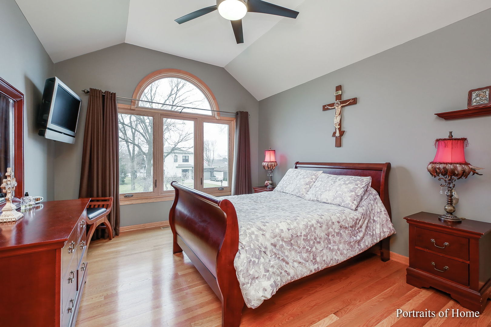 655 Mary Court Elmhurst, IL 60126 - Photo 29 of 46 a bedroom with a bed and a chandelier