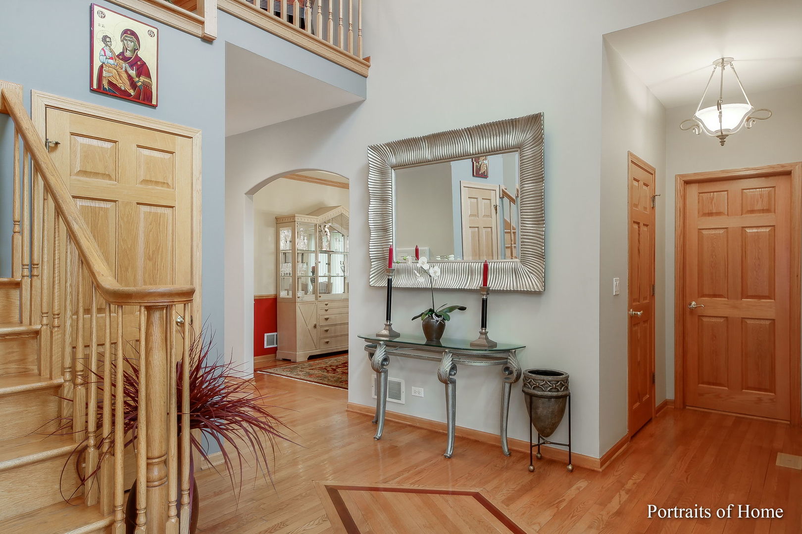 655 Mary Court Elmhurst, IL 60126 - Photo 6 of 46 a view of hall way with furniture and chandelier