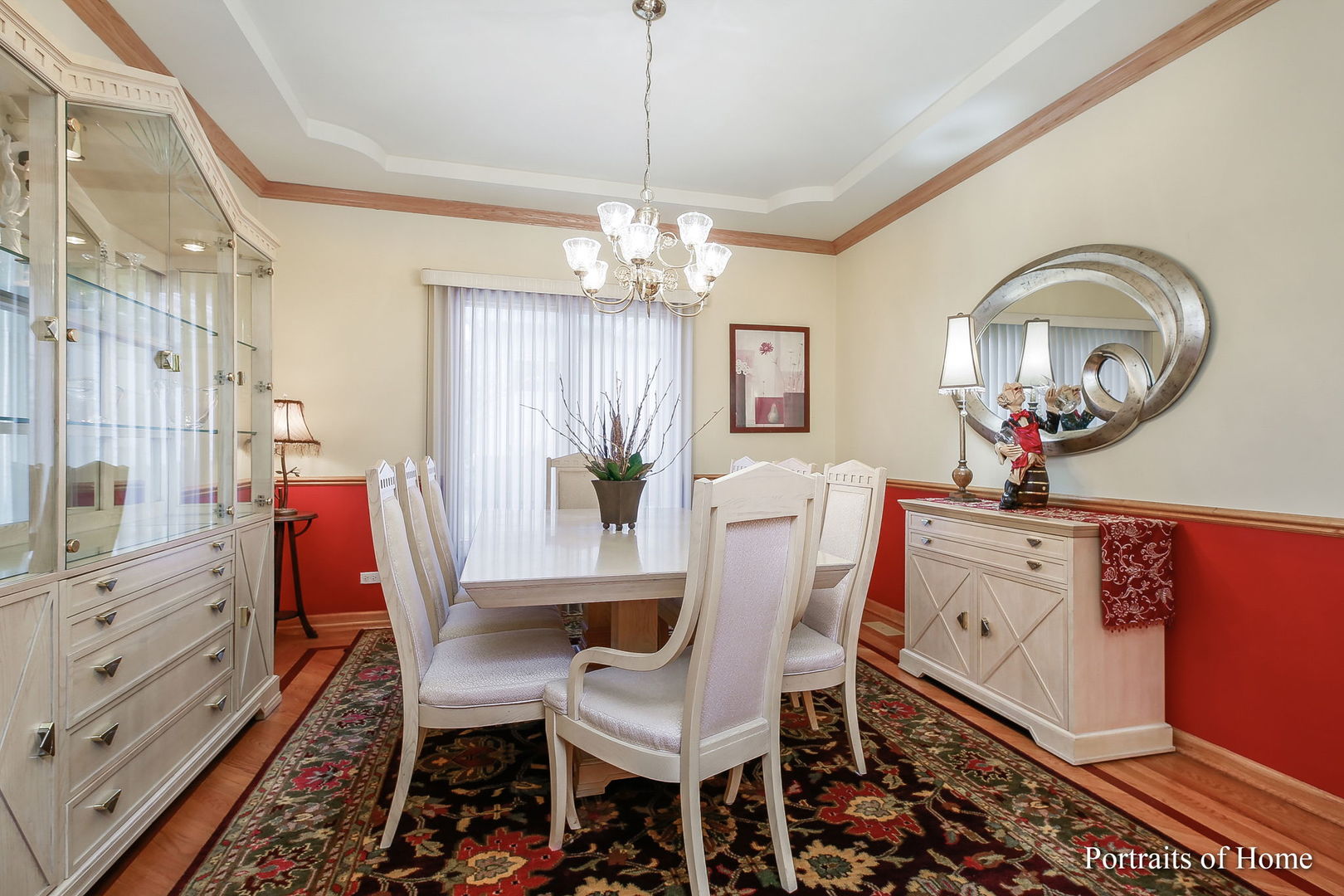 655 Mary Court Elmhurst, IL 60126 - Photo 7 of 46 a dining room with furniture a chandelier and wooden floor