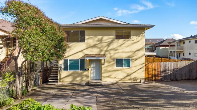 a view of a house with a patio