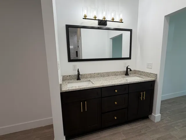 a bathroom with a bathtub toilet and sink