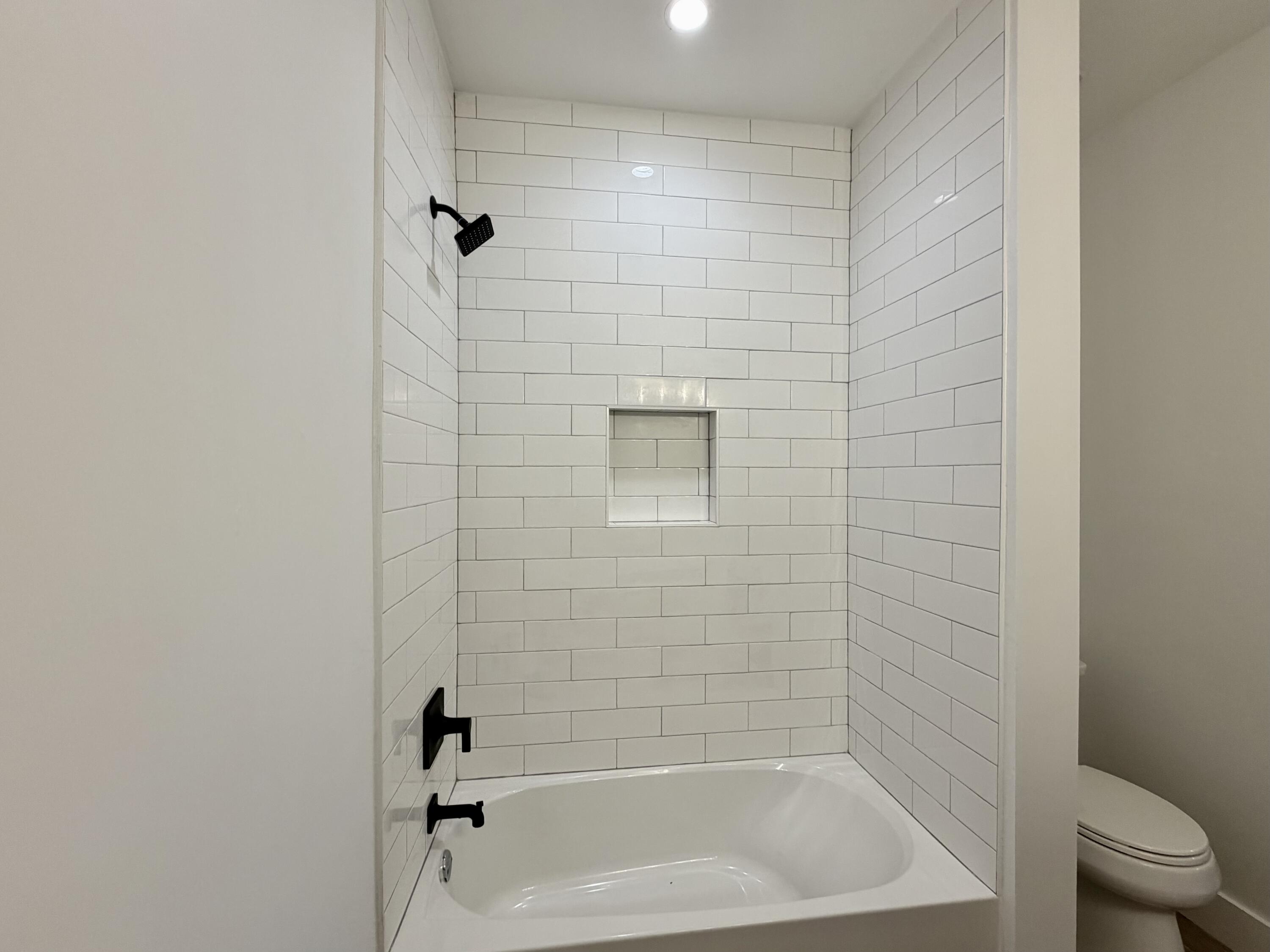 874 West Orange Avenue DeFuniak Springs, FL 32435 - Photo 27 of 32 tiled tub/shower