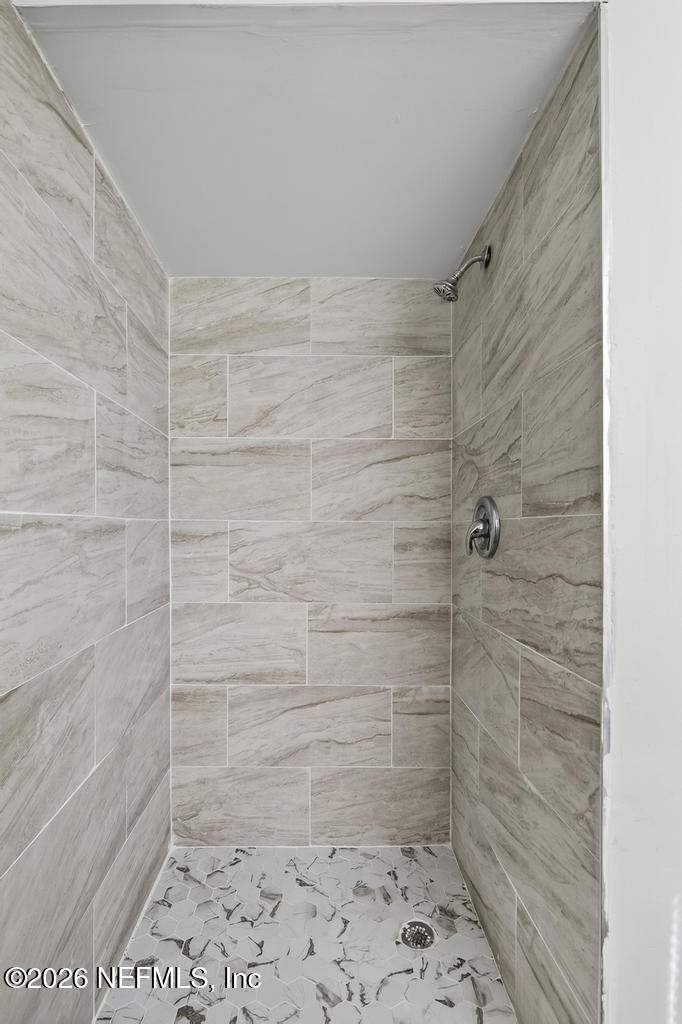 3024 Kline Road Jacksonville, FL 32246 - Photo 11 of 25 a bathroom with a shower