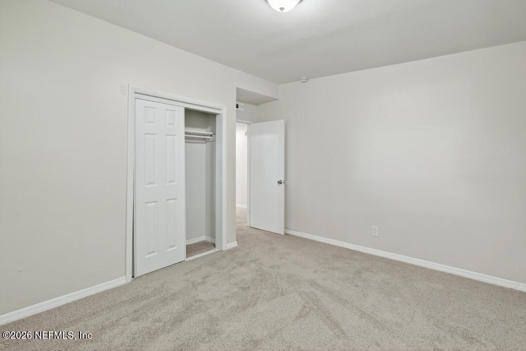 3024 Kline Road Jacksonville, FL 32246 - Photo 13 of 25 an empty room with closet area