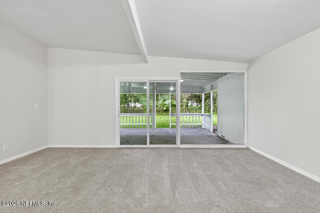 3024 Kline Road Jacksonville, FL 32246 - Photo 18 of 25 a view of empty room with floor to ceiling window