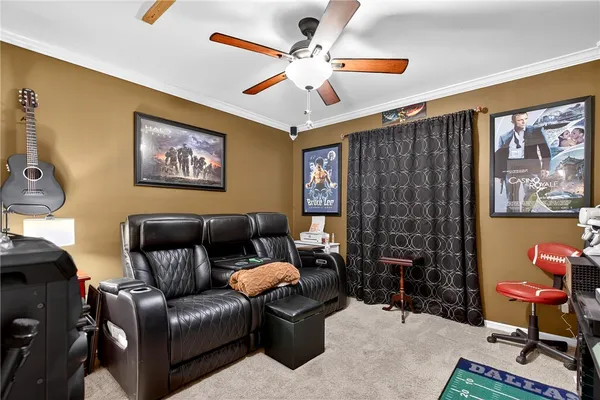 a living room with furniture a lamp and a chandelier