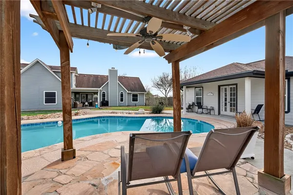 a view of house with outdoor seating space