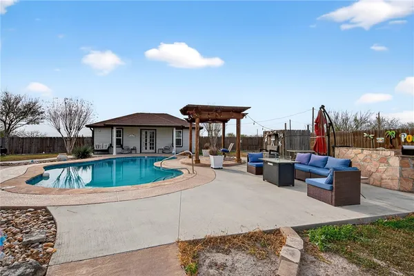 a view of houses with outdoor kitchen