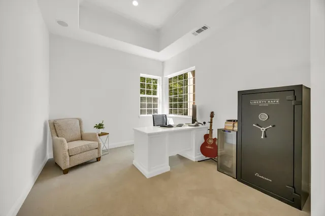 a living room with furniture and window