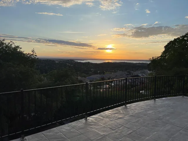 a view of balcony with ocean view