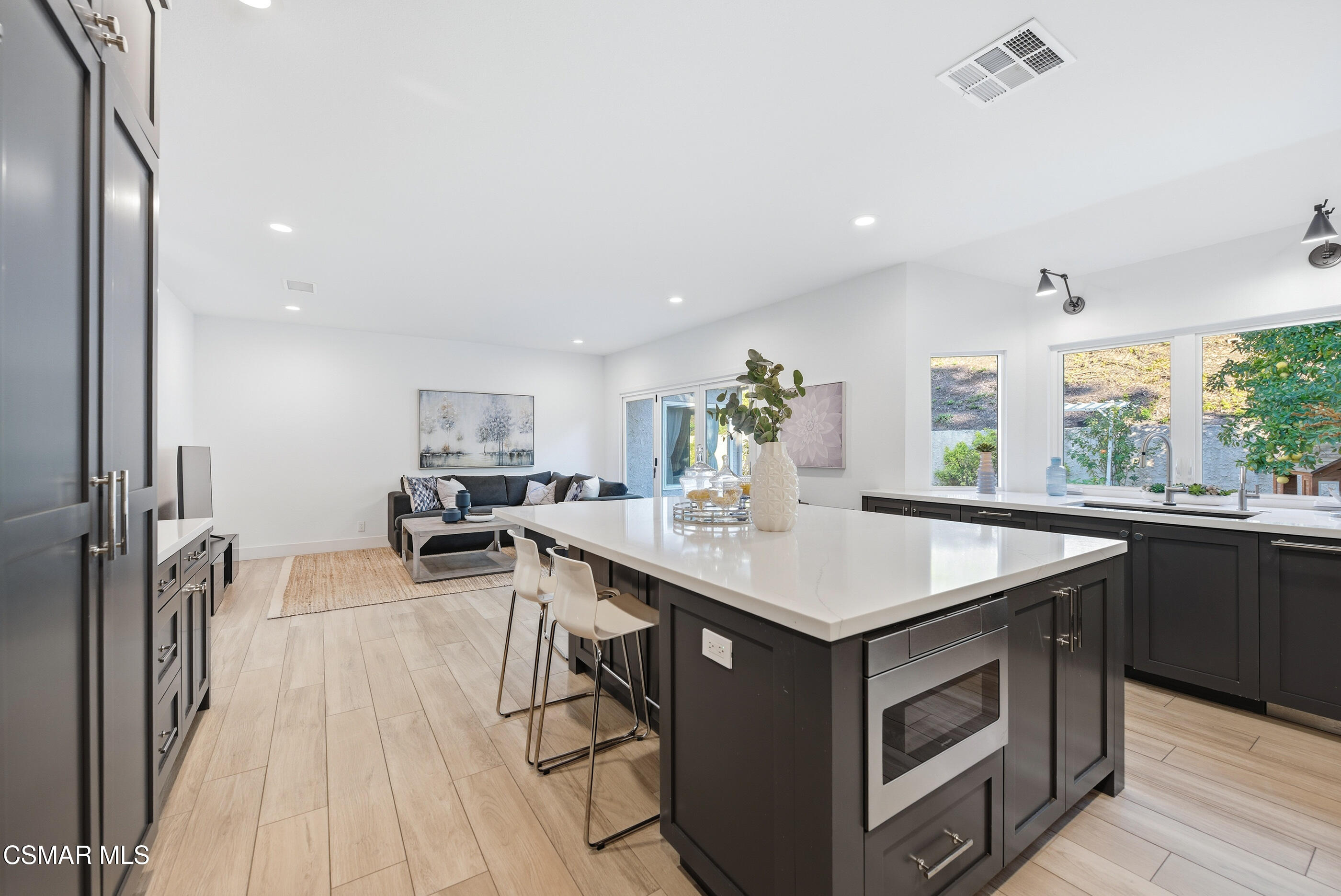 2810 Rikkard Drive Thousand Oaks, CA 91362 - Photo 14 of 38 a kitchen with a stove a sink dishwasher and a refrigerator