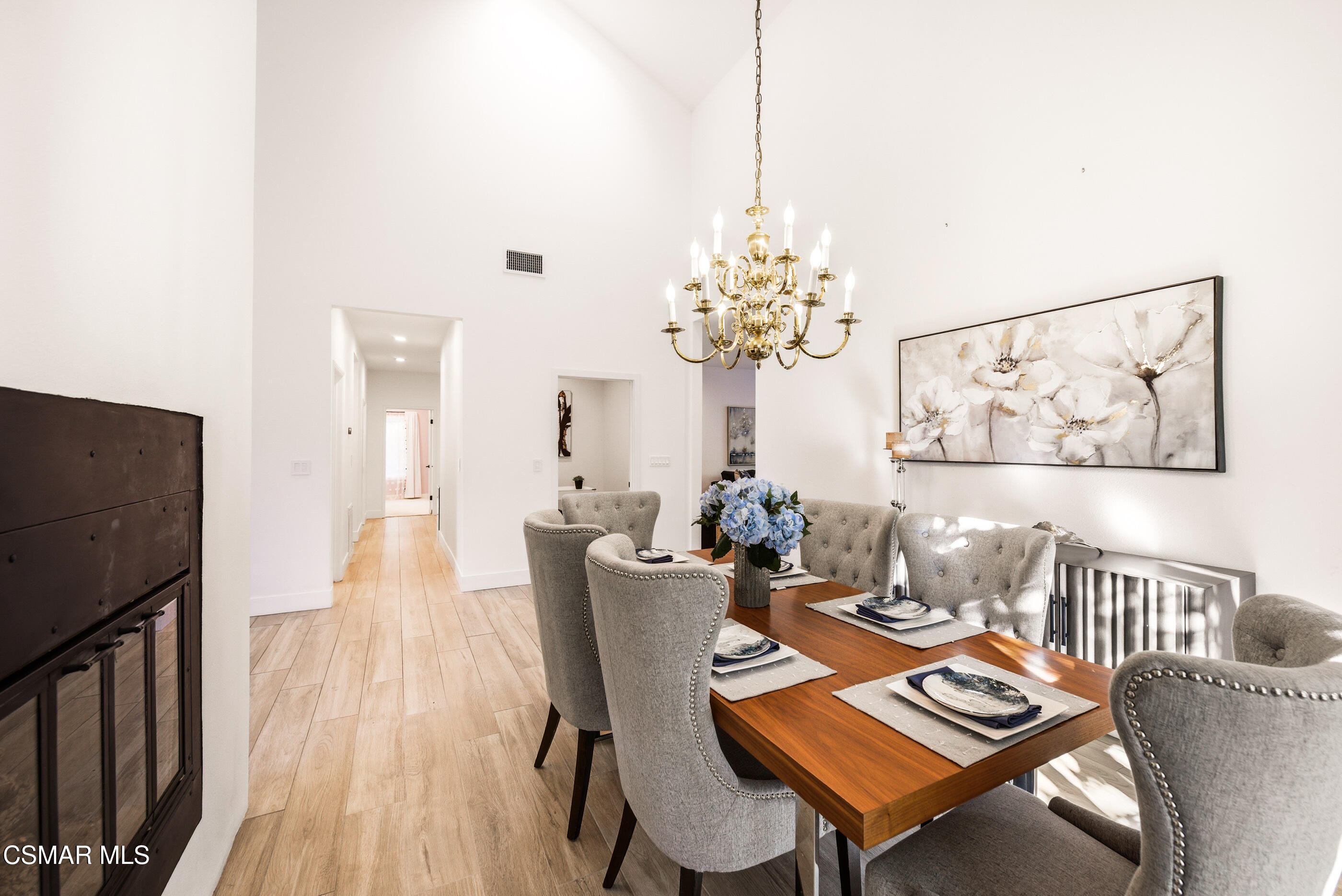 2810 Rikkard Drive Thousand Oaks, CA 91362 - Photo 15 of 38 a view of a dining room with furniture and chandelier