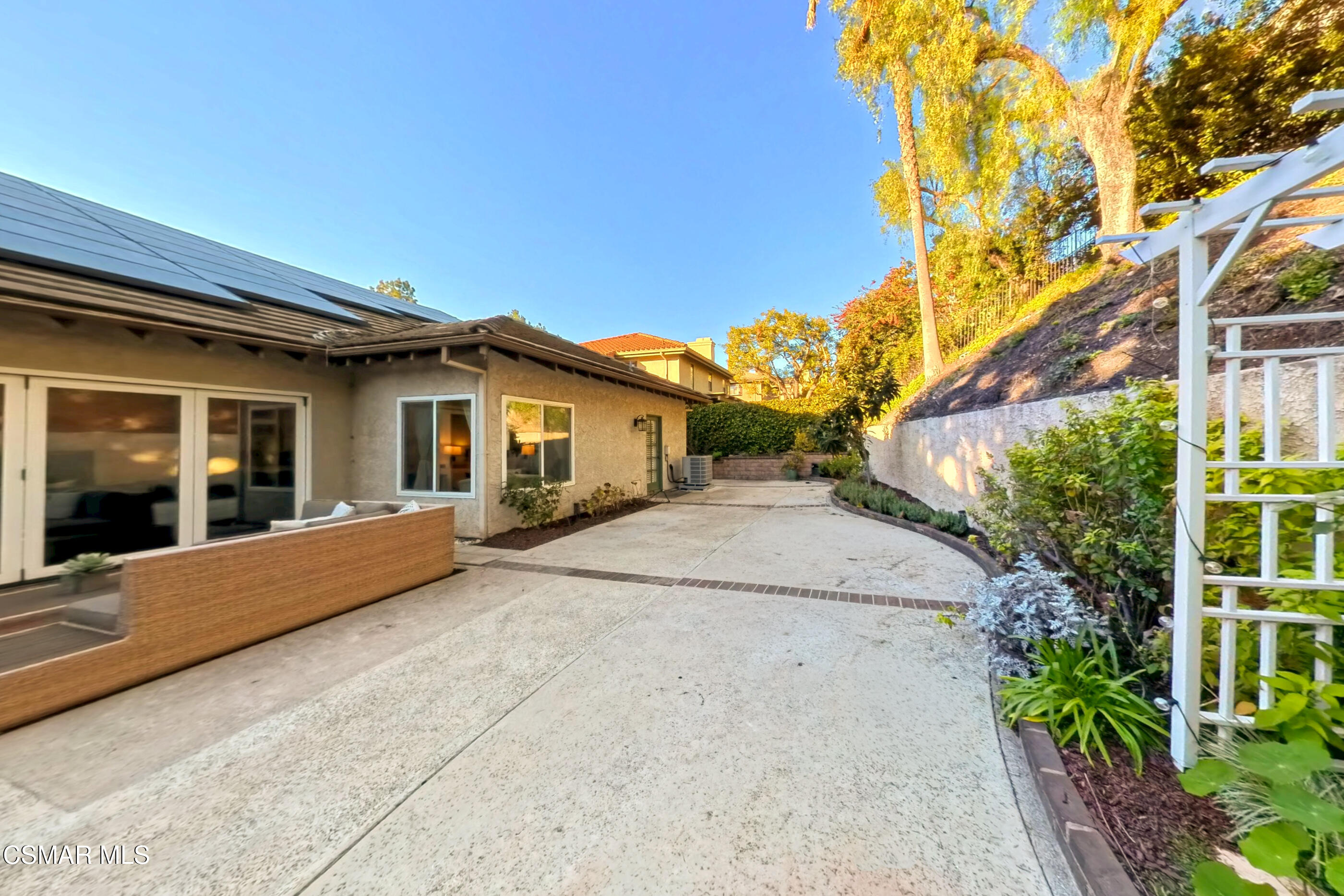 2810 Rikkard Drive Thousand Oaks, CA 91362 - Photo 34 of 38 a view of a house with a backyard and tree