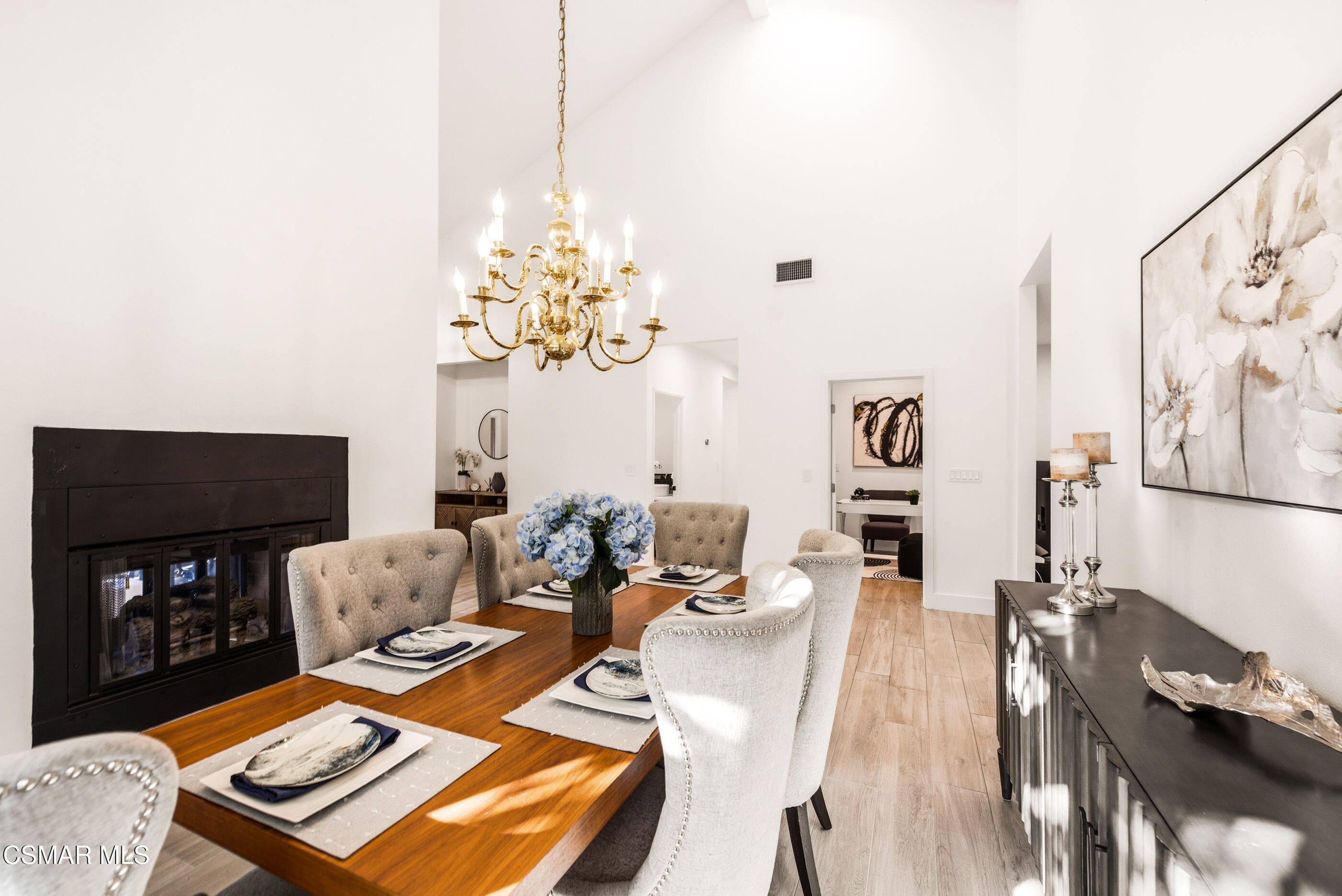 2810 Rikkard Drive Thousand Oaks, CA 91362 - Photo 9 of 38 a living room with furniture a rug and a flat screen tv