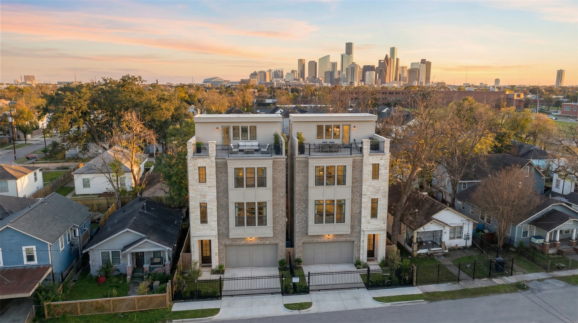 1222 Genova Street Houston, TX 77009 - Photo 2 of 15 a view of a city that has tall buildings