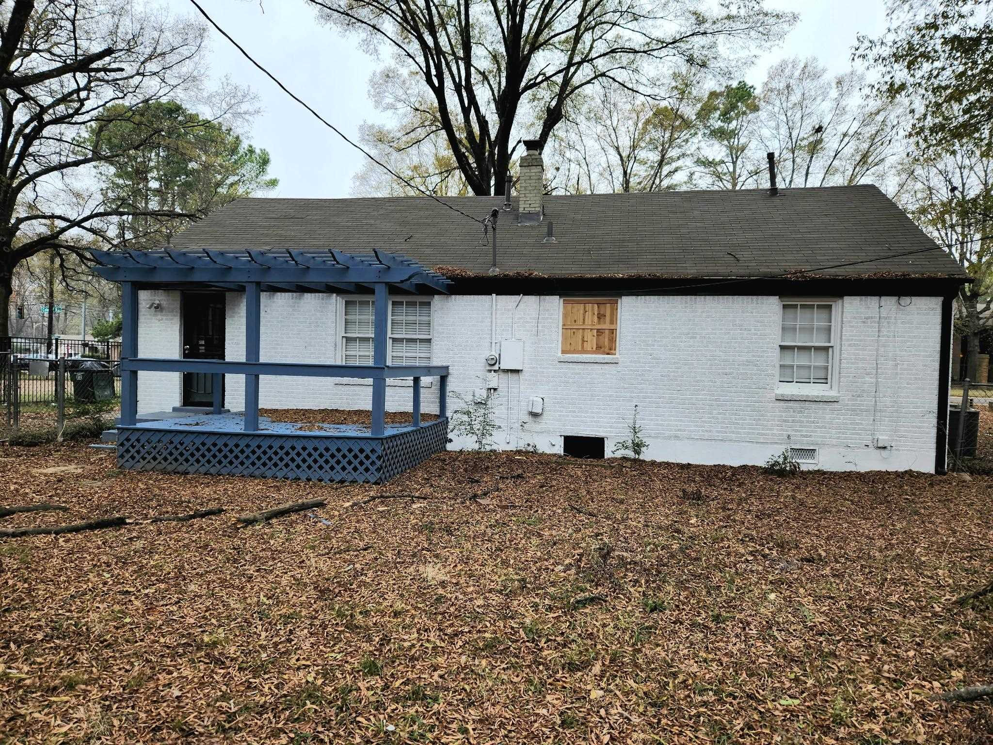 866 Colonial Road Memphis, TN 38117 - Photo 15 of 15 a front view of a house with a yard