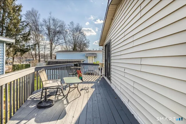 a view of balcony with furniture