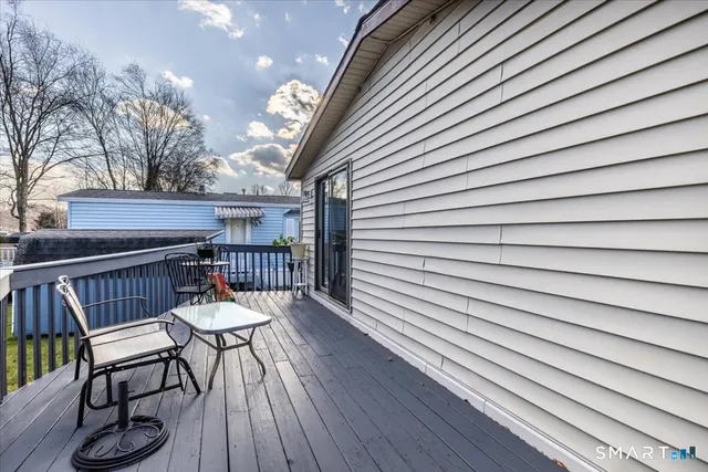 a view of a chairs with wooden floor