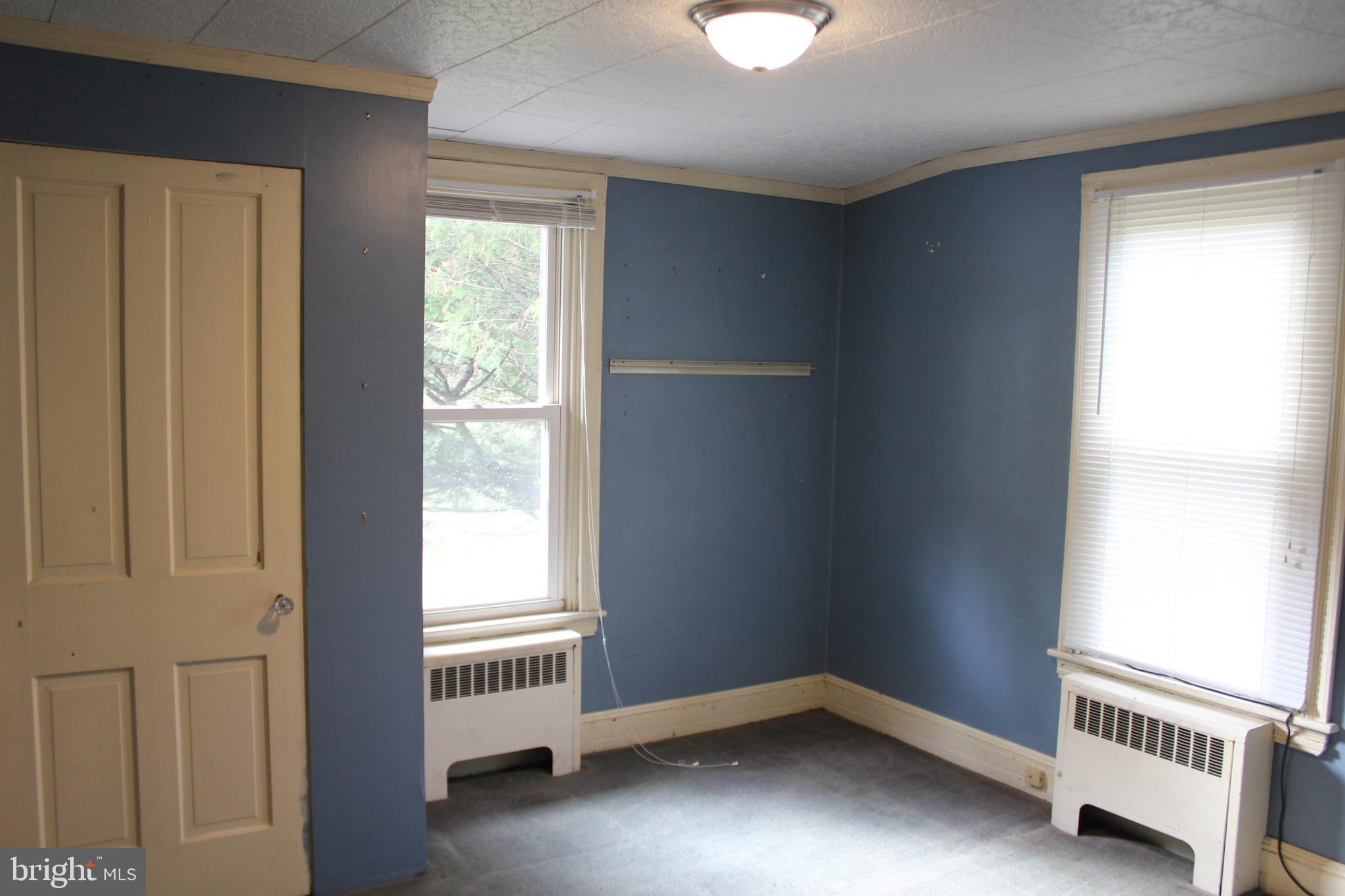 72 Sproul Road Malvern, PA 19355 - Photo 14 of 31 a view of an empty room and a window