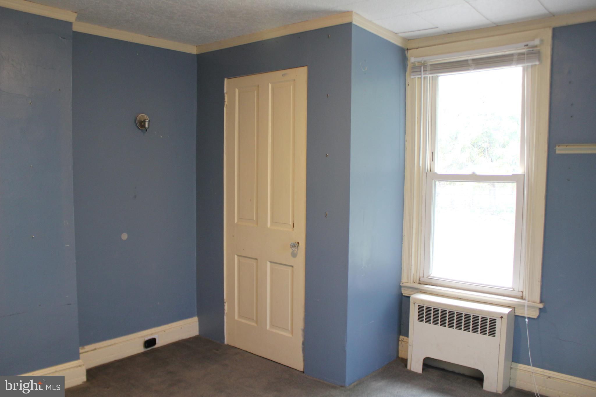 72 Sproul Road Malvern, PA 19355 - Photo 15 of 31 a view of an empty room with a window