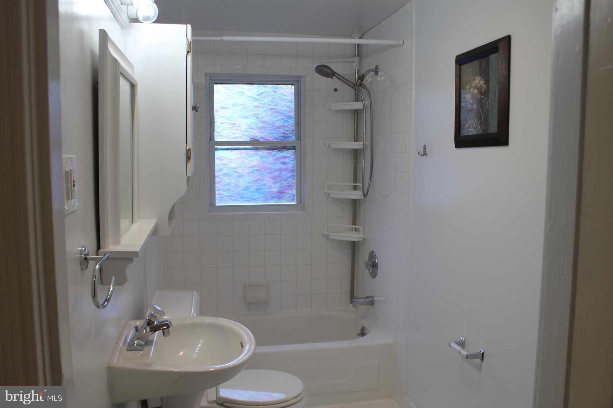 72 Sproul Road Malvern, PA 19355 - Photo 18 of 31 a bathroom with a sink toilet and shower