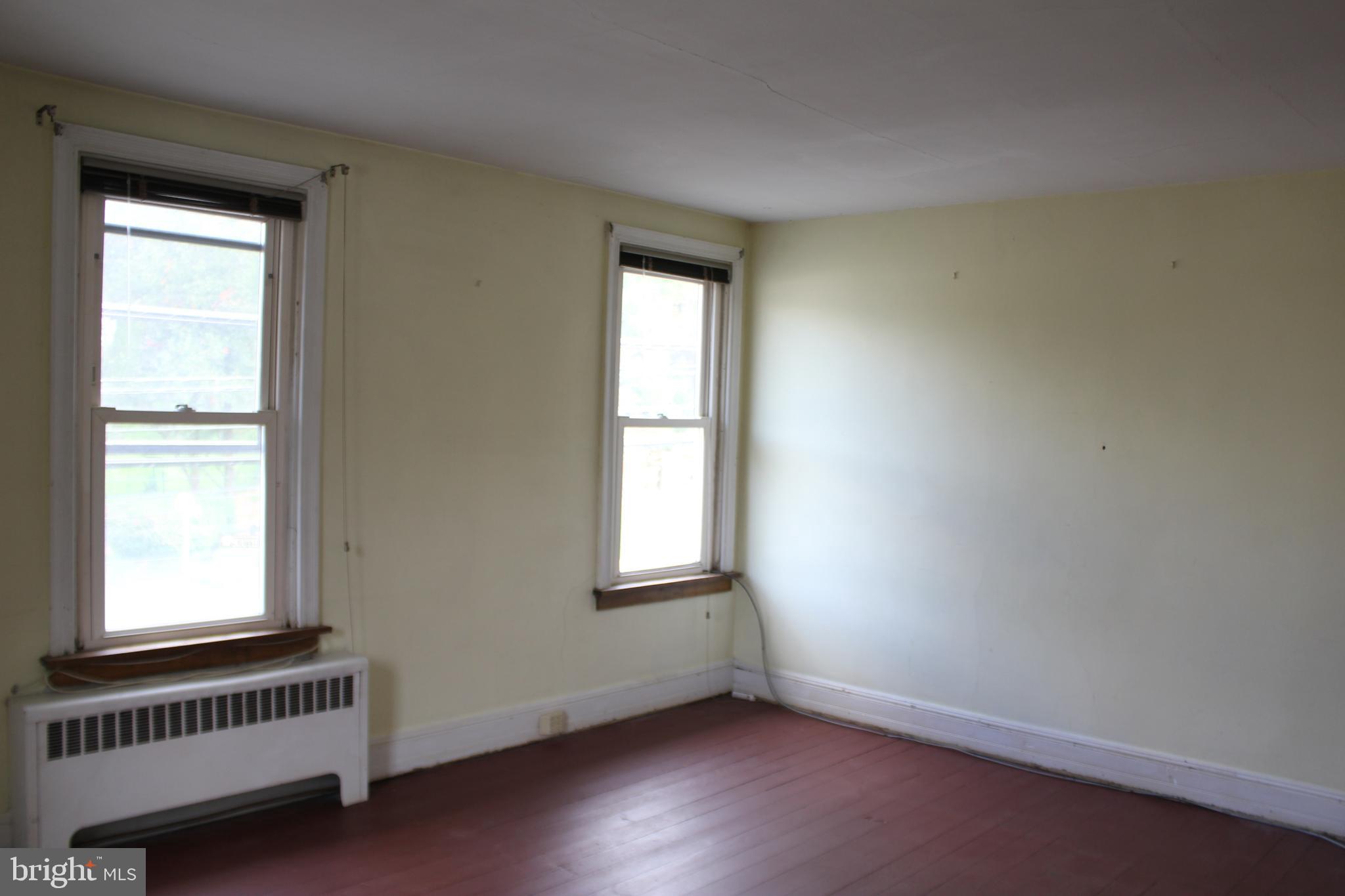 72 Sproul Road Malvern, PA 19355 - Photo 21 of 31 a view of an empty room with a window