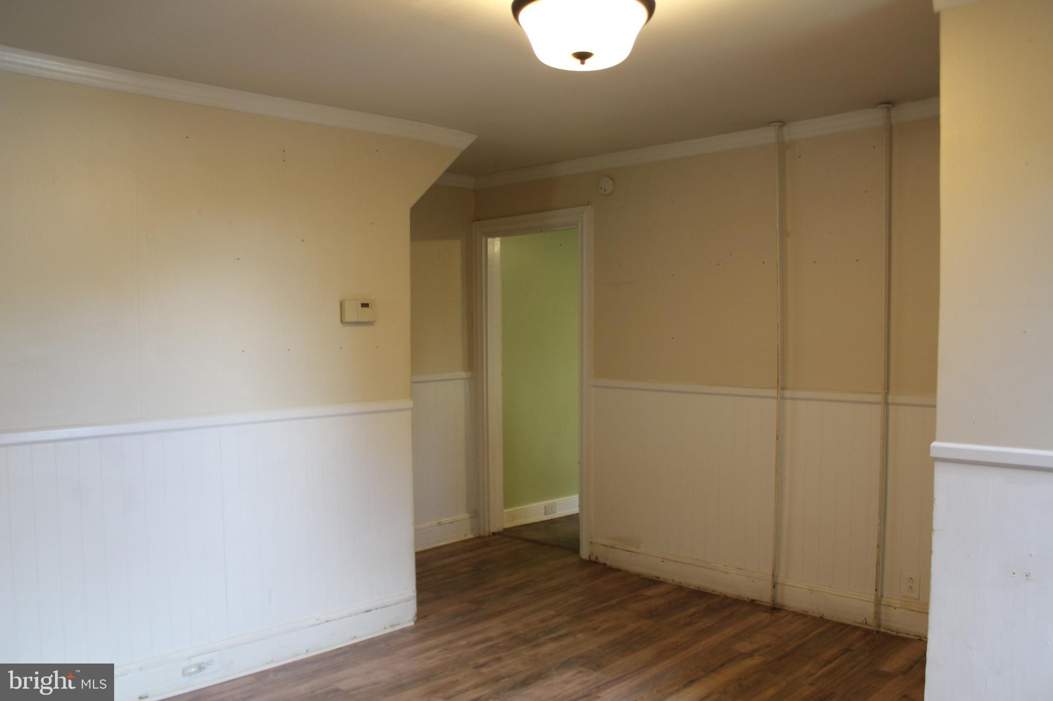 72 Sproul Road Malvern, PA 19355 - Photo 8 of 31 an empty room with wooden floor