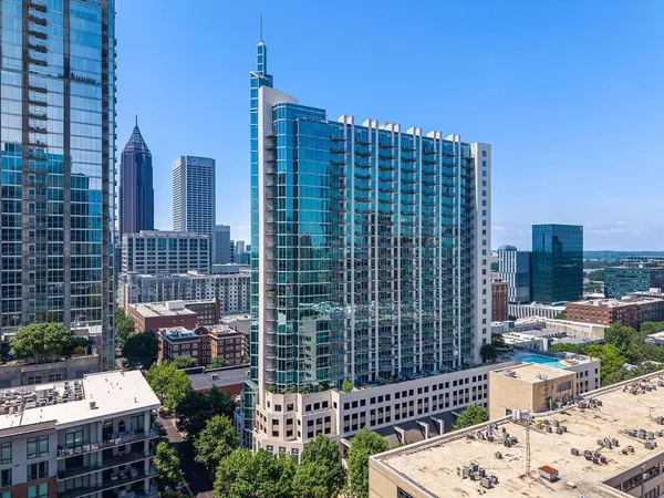 a view of a city with tall buildings