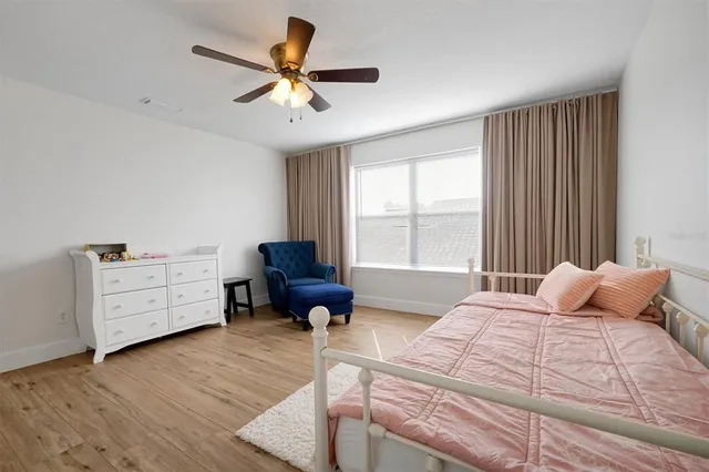 a view of a house with a flower garden