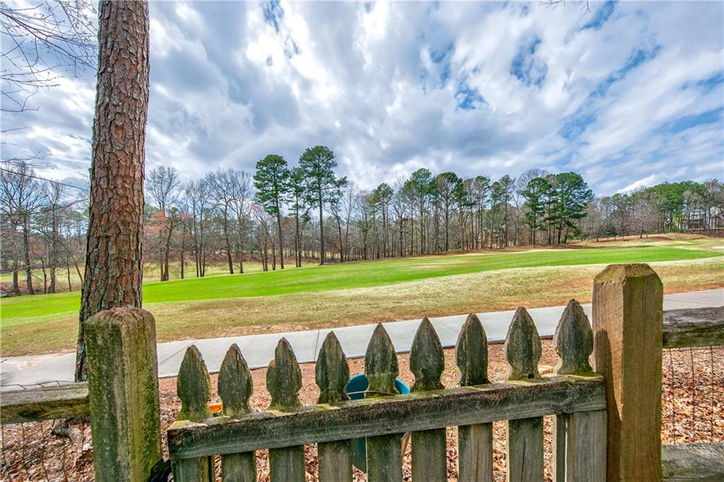 6460 Rutherford Place Suwanee, GA 30024 - Photo 21 of 35 a view of a bench in a park