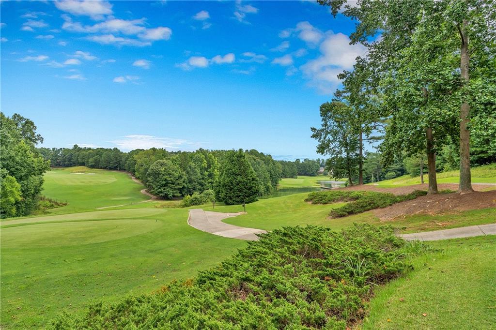 6460 Rutherford Place Suwanee, GA 30024 - Photo 29 of 35 a view of field with grass and trees
