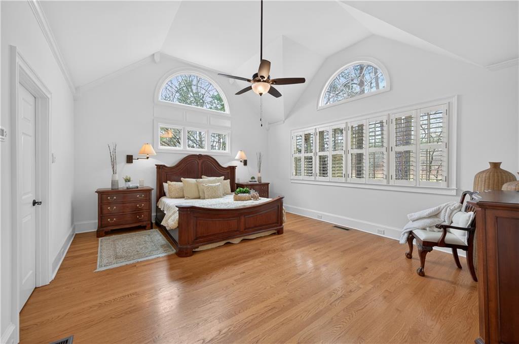 6460 Rutherford Place Suwanee, GA 30024 - Photo 3 of 35 a living room with furniture and a chandelier