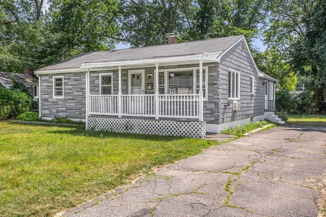 a house view with a garden space