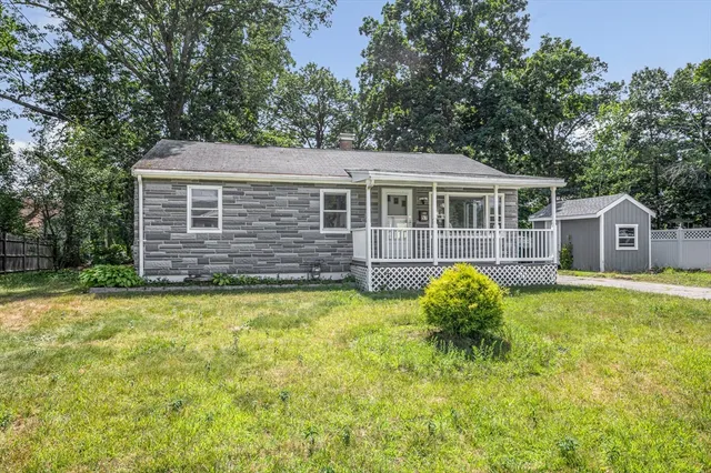 a view of a two chairs in the balcony