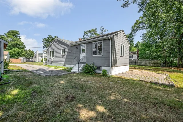 a house view with a garden space