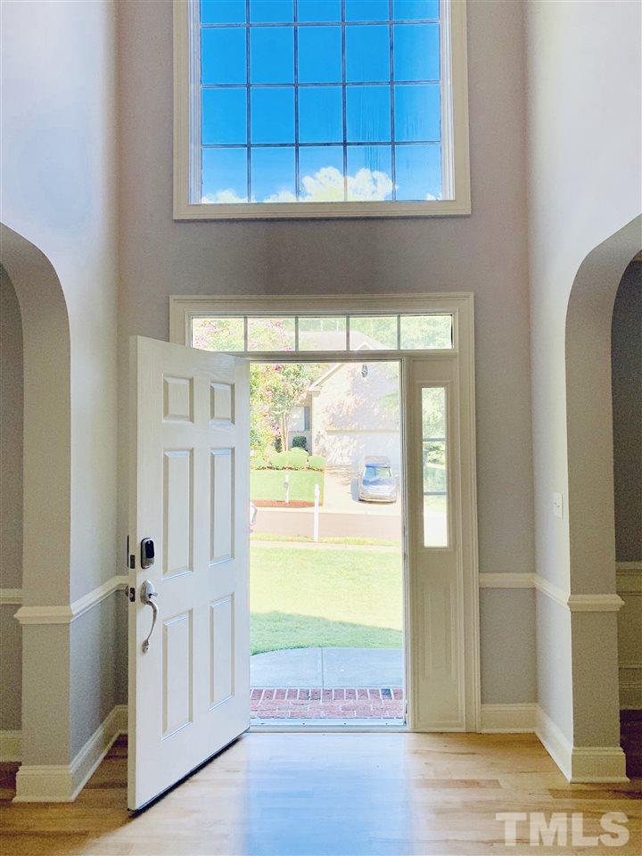 8917 Riverview Park Drive Raleigh, NC 27613 - Photo 3 of 29 a view of an entryway with a kitchen