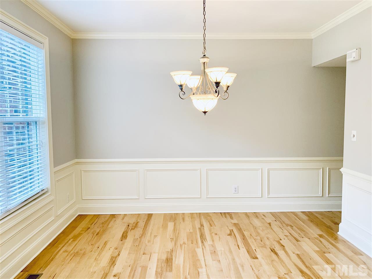8917 Riverview Park Drive Raleigh, NC 27613 - Photo 5 of 29 a view of an empty room with a window
