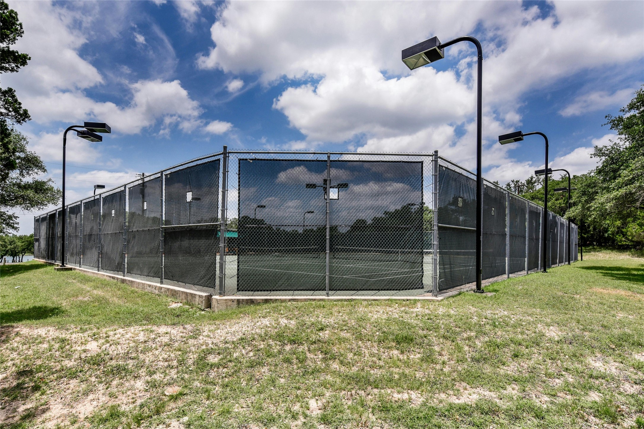 6802 Cedar Ridge Circle Lago Vista, TX 78645 - Photo 15 of 19 View of POA tennis court