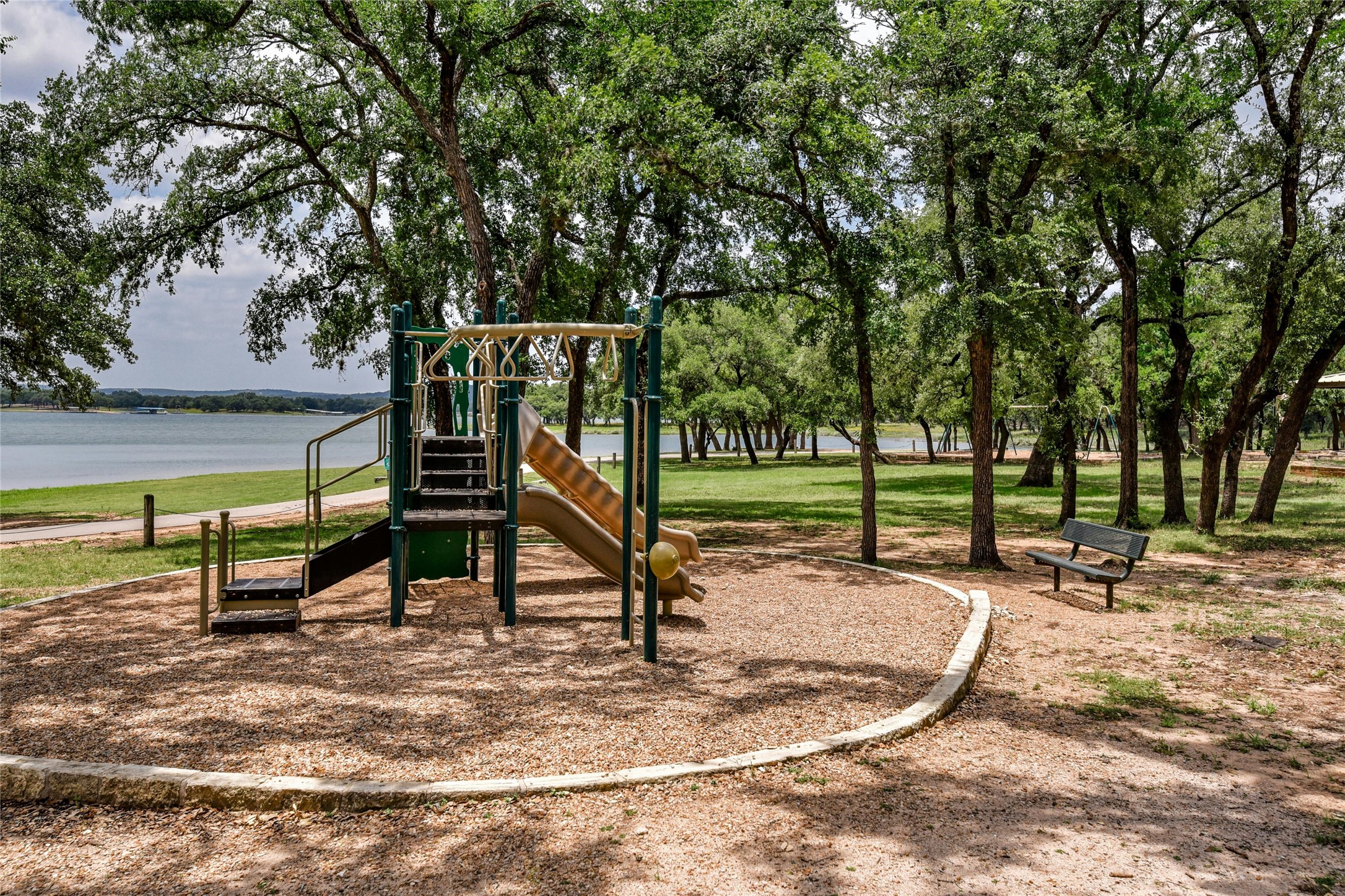 6802 Cedar Ridge Circle Lago Vista, TX 78645 - Photo 18 of 19 Community jungle gym at one of the lakeside POA parks