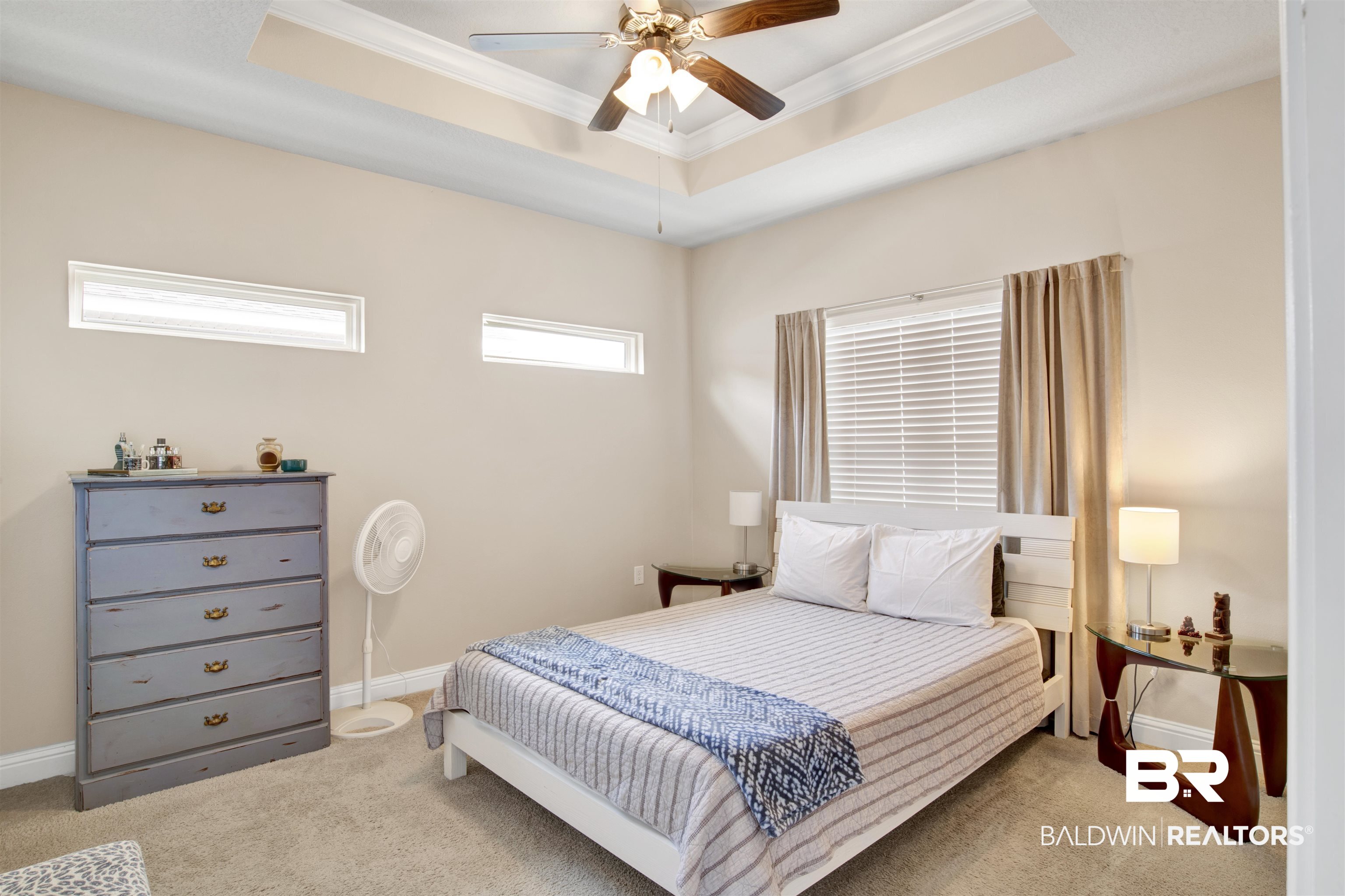 6825 Spaniel Drive, Unit A Daphne, AL 36527 - Photo 12 of 27 Primary bedroom with en-suite bath