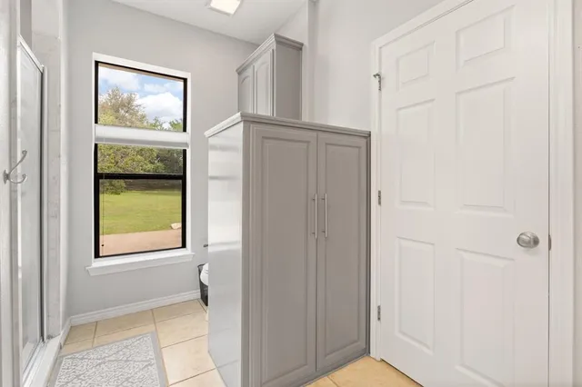 a view of an entryway with wooden floor