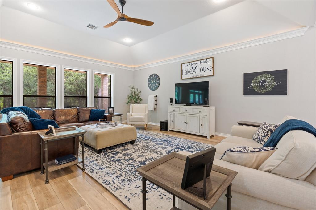 12041 Shady Creek Drive Whitney, TX 76692 - Photo 4 of 40 a living room with furniture and a large window