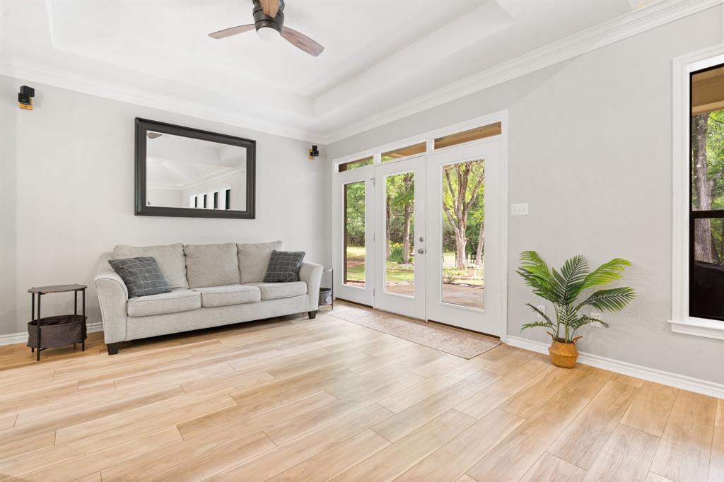 12041 Shady Creek Drive Whitney, TX 76692 - Photo 6 of 40 a living room with furniture and a large window