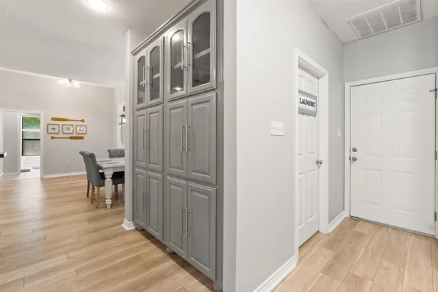 a view of livingroom with furniture and wooden floor