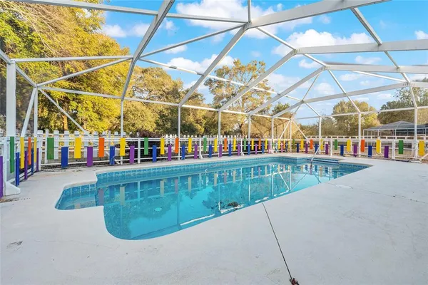 a view of outdoor space with deck and yard