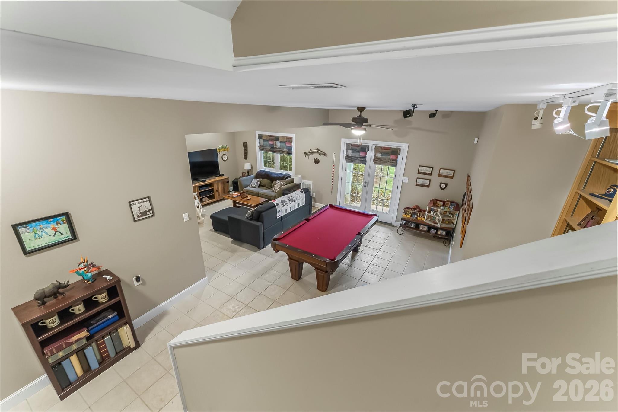 1726 Waterford Way Morganton, NC 28655 - Photo 15 of 45 a living room with furniture and a flat screen tv