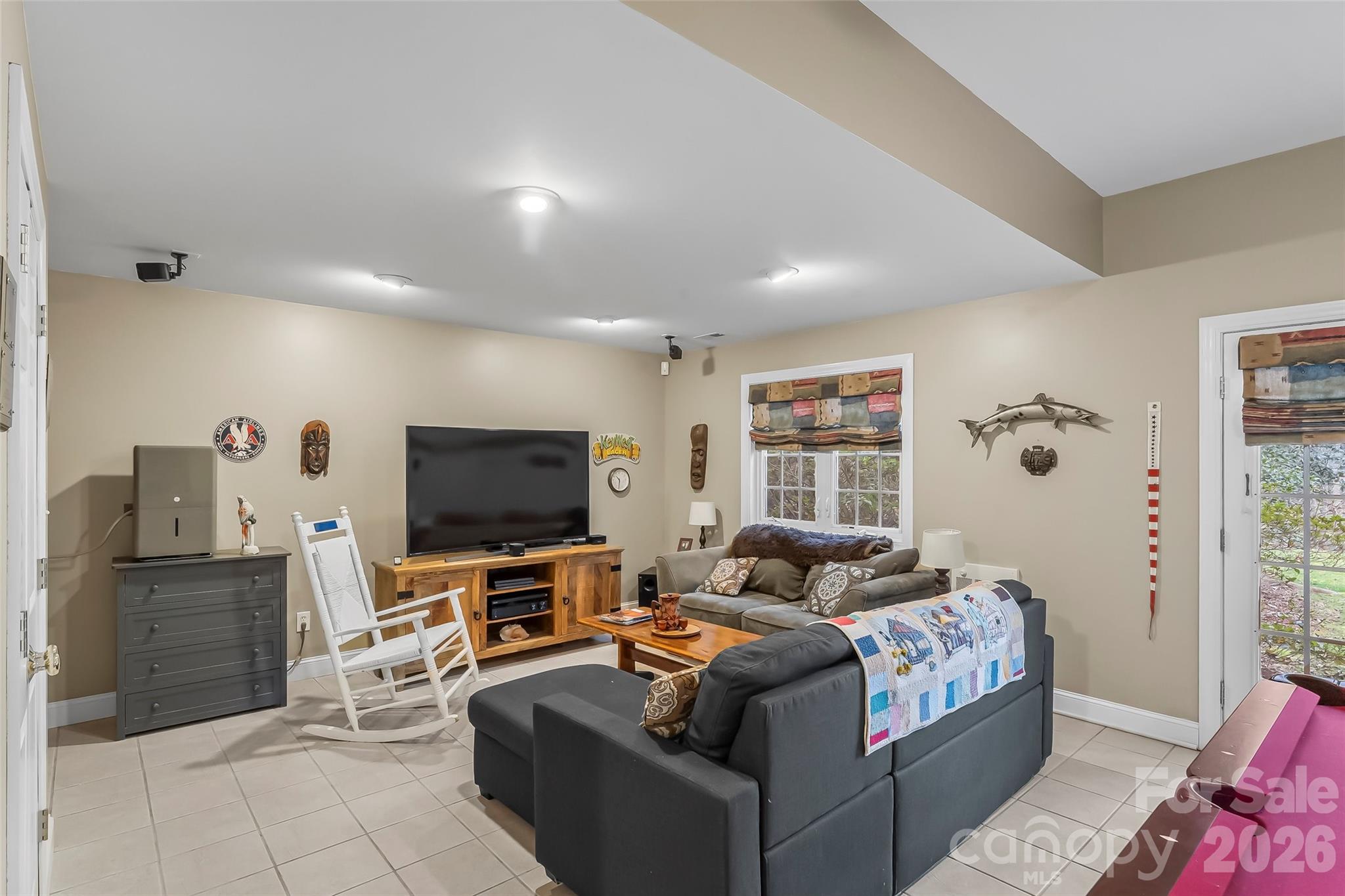 1726 Waterford Way Morganton, NC 28655 - Photo 17 of 45 a living room with furniture and a flat screen tv