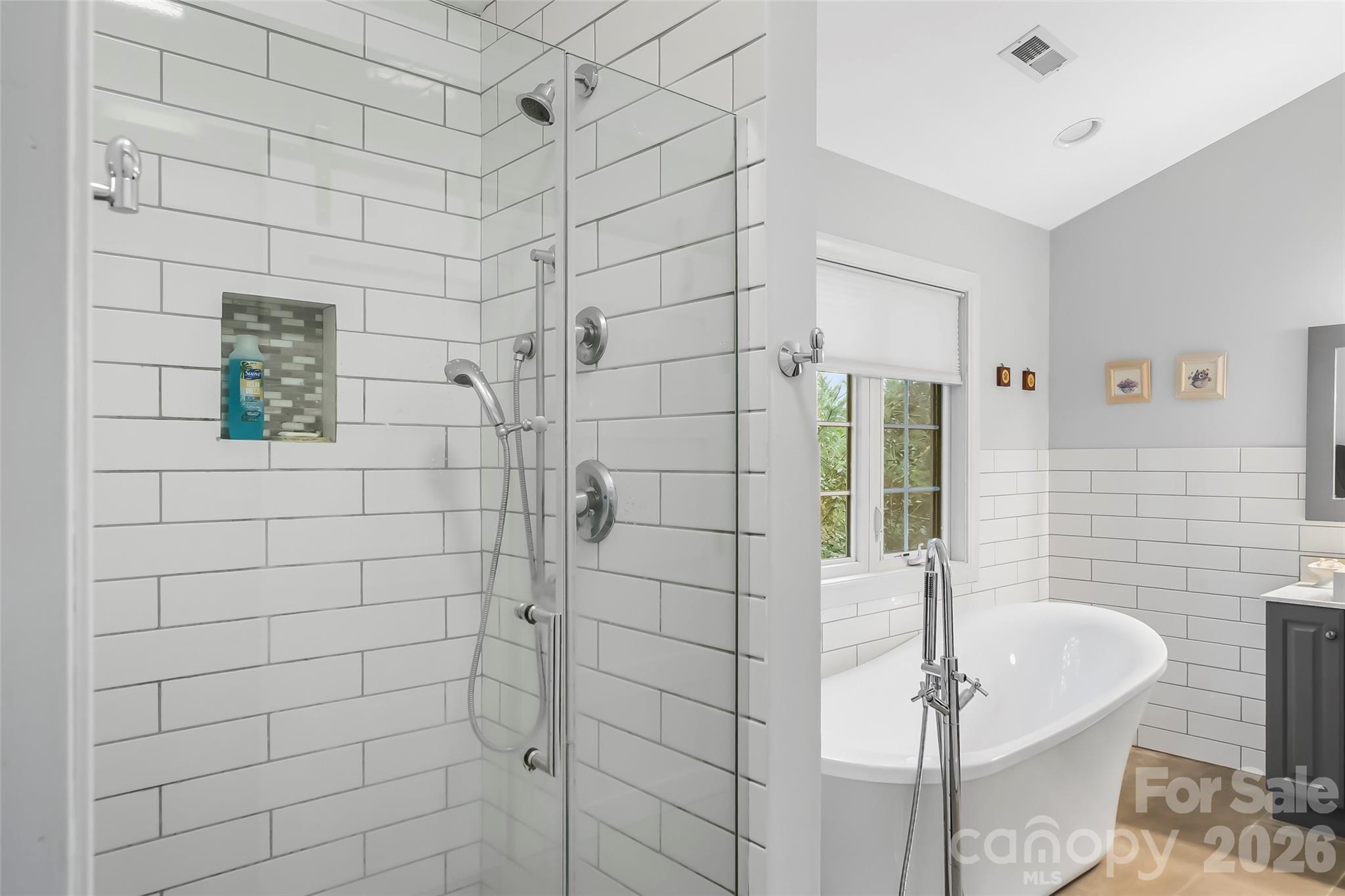 1726 Waterford Way Morganton, NC 28655 - Photo 26 of 45 a bathroom with a sink shower and a mirror
