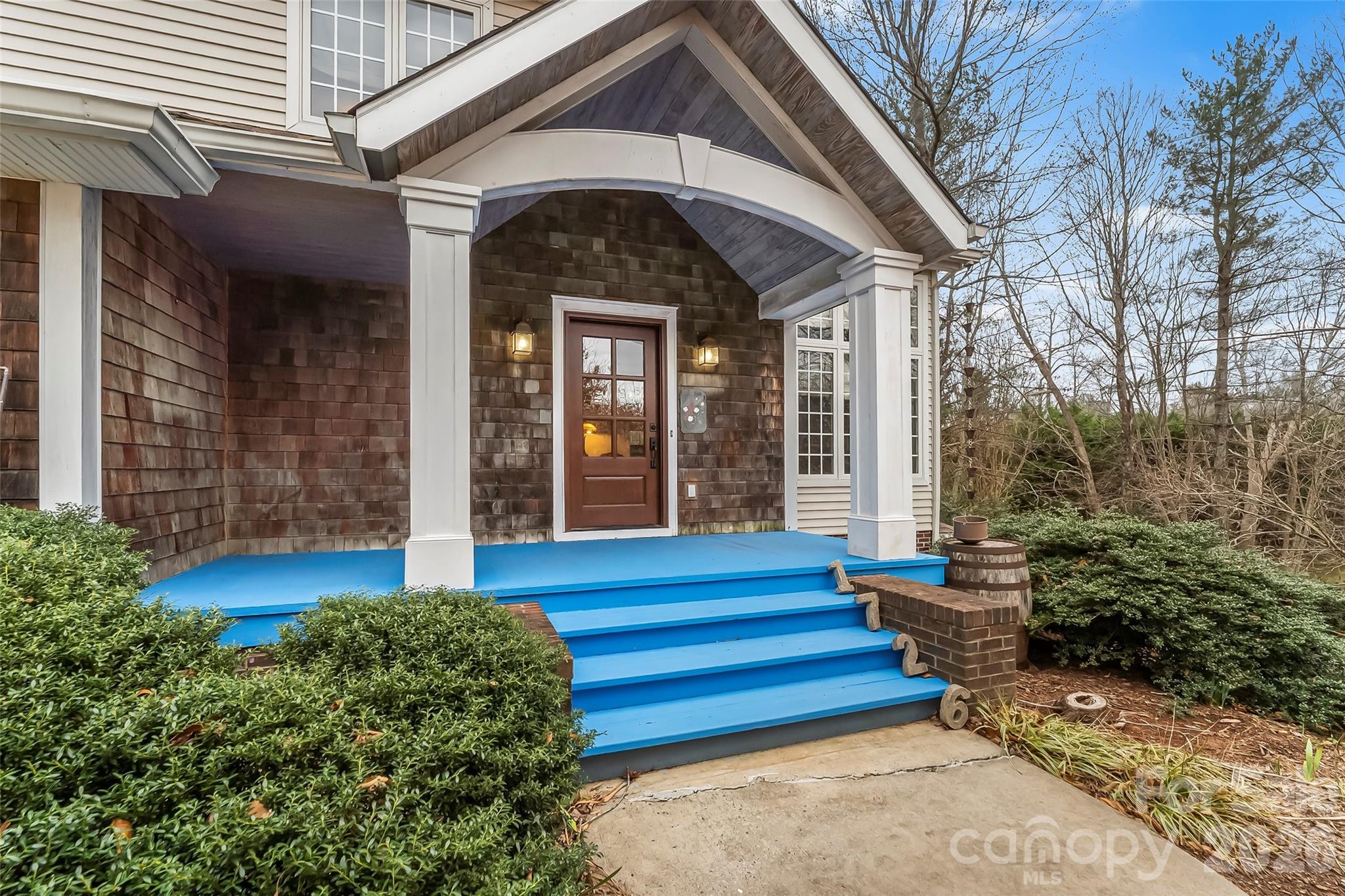 1726 Waterford Way Morganton, NC 28655 - Photo 3 of 45 a front view of a house with a garden